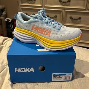 Brand new Hoka, tennis shoes, size 9 very stylish very comfortable